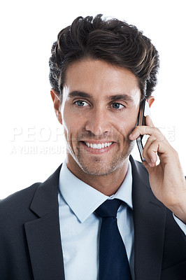 Buy stock photo Smiling young businessman on his cellphone while isolated on white