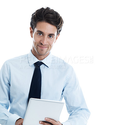 Buy stock photo Smiling young businessman using a digital tablet against a white background