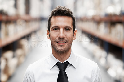 Buy stock photo Smiling warehouse manager standing in a warehouse
