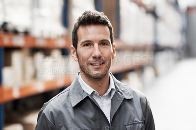 Buy stock photo Portrait of a handsome warehouse worker smiling