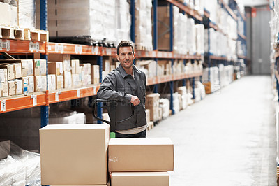 Buy stock photo Portrait of a young man standing in a warehouse