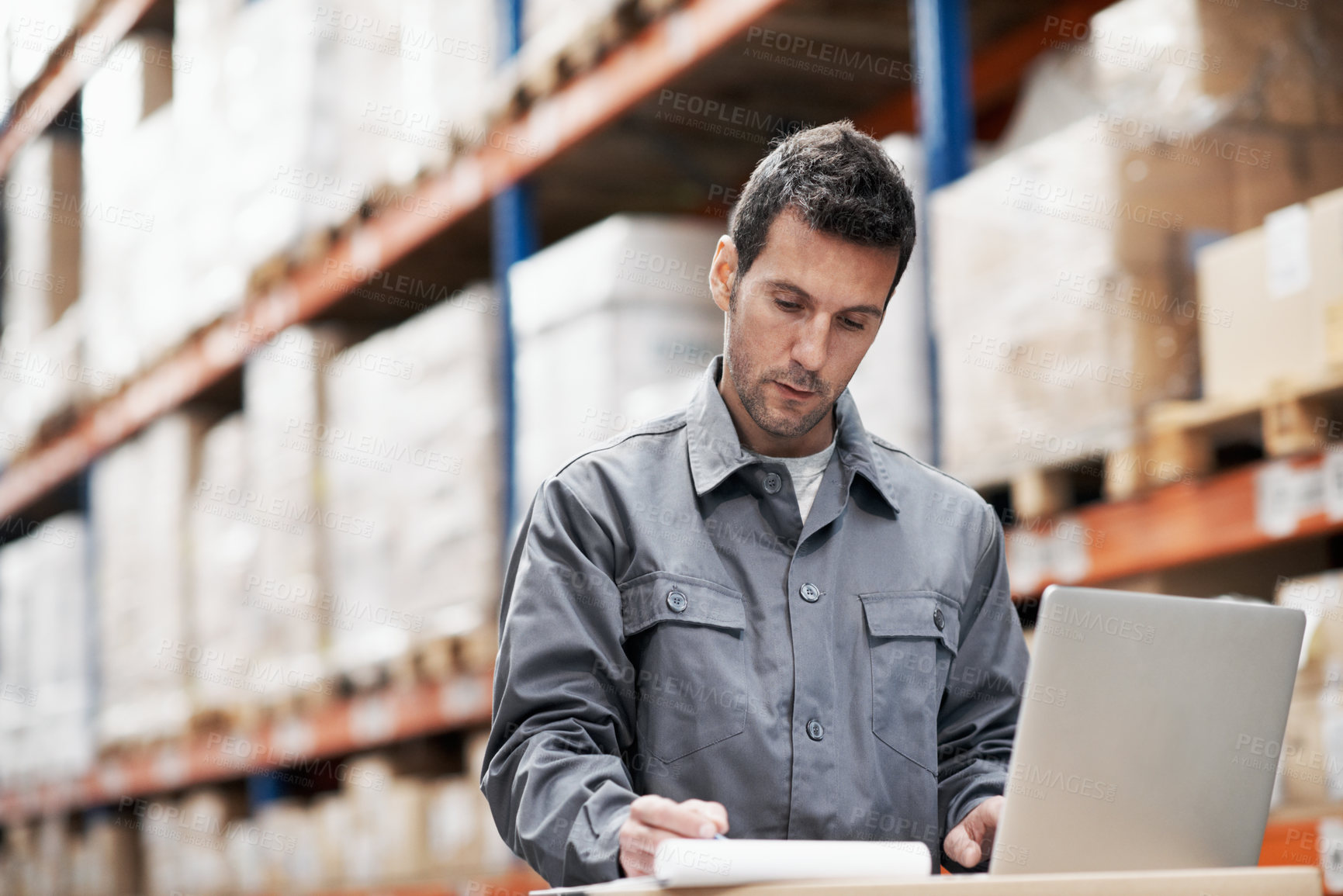 Buy stock photo Laptop, clipboard and logistics with man in warehouse for shipping route, tracking code and cargo. Inventory checklist, ecommerce delivery and tech with person in factory for supplier distribution