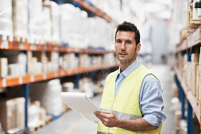 Buy stock photo Portrait of a young man doing stock take in a warehouse