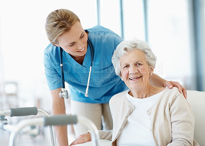 Buy stock photo Smile, caregiver or senior woman in nursing home, medical support or rehabilitation with walker. Walking frame, nurse and happy person with disability, elderly care or portrait for help in retirement