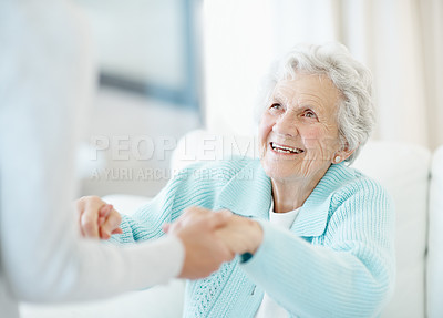 Buy stock photo Home, holding hands and help up with senior woman, physiotherapy and happy for rehabilitation. Support, assistance and elderly person with physiotherapist, smile and aid for health recovery at house