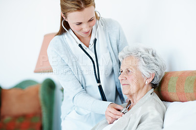 Buy stock photo Doctor, stethoscope and old woman in bedroom for cardiology, breathing and respiratory evaluation. Elderly person, assistance or healthcare worker listen with medical tools, heart rate or house visit