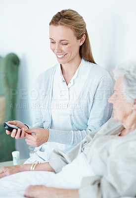 Buy stock photo Checkup, caregiver or old woman on bed with blood test, medical review or glucose exam in retirement. Smile, volunteer or senior person with meter, diabetic care or health assessment in nursing home.