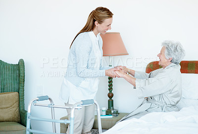 Buy stock photo Walker, caregiver or old woman in bedroom with helping hand, support or service in retirement care. Happy, volunteer or elderly person with disability, mobility assistance or aid in nursing home.
