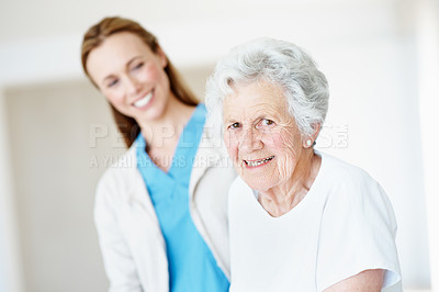 Buy stock photo Wellness, caregiver or old woman in nursing home with portrait, optimism or satisfaction in elderly care. Wellbeing, senior person or nurse with good mood, patient support or happiness in retirement.