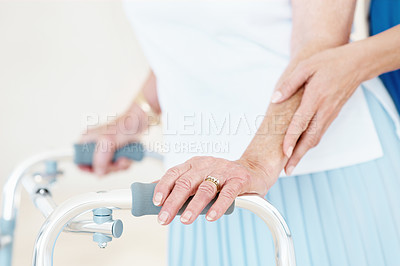 Buy stock photo Hands, walker and physiotherapist with elderly patient for help, balance or assisted living. Nurse, walking frame or person with disability in retirement, rehabilitation or therapy for mobility aid