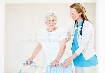 Buy stock photo Assisted living, caregiver and senior woman with walker at home, medical support or rehabilitation. Walking frame, nurse and person with disability, elderly care and portrait for help in retirement