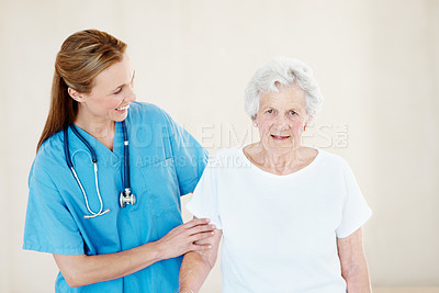 Buy stock photo Nurse, smile and elderly woman in nursing home for support, healthcare and care in assisted living. Caregiver, happy and senior resident in retirement center for wellness, service and portrait