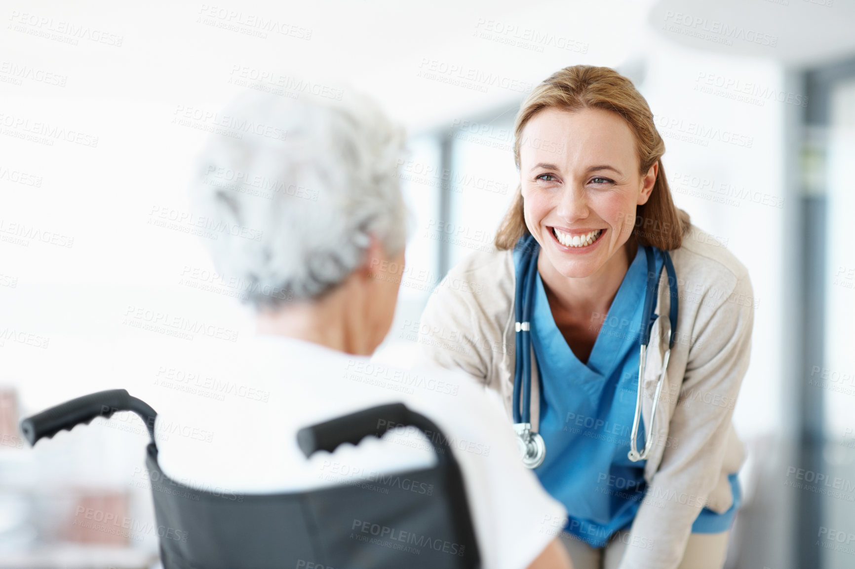 Buy stock photo Caregiver, laugh and old woman in wheelchair for support, talk and healthcare or senior care. Nurse, elderly patient or person with disability, wellness and happy in retirement at nursing home