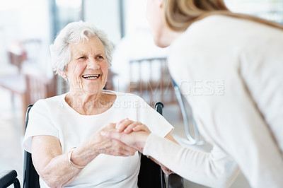 Buy stock photo Nurse, handshake and old woman in retirement home with wheelchair, greeting or smile for medical help. Healthcare worker, shaking hands and happy senior person with disability, trust or consultation.