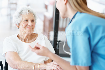 Buy stock photo Nurse, trust and elderly woman on wheelchair for healthcare, assisted living and medical support. Happy caregiver, help or senior person with disability, connection or comfort in consultation at home