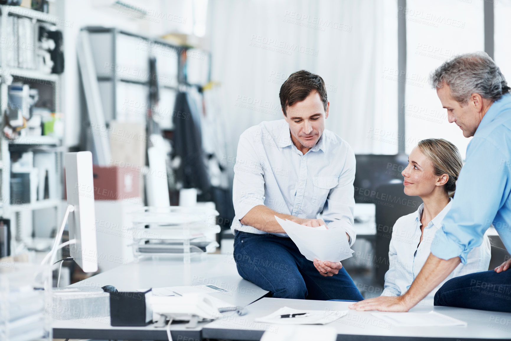 Buy stock photo People, document and reading in office for finance, business proposal or company development. Men, woman and paperwork in agency for invoice statement, tax compliance certificate or happy for balance