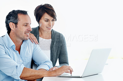 Buy stock photo Research, happy or couple in house with laptop, trip plan or holiday selection on travel booking site. Smile, mature man or woman with tech, vacation review or resort decision on tourist platform.