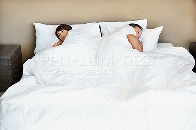 Buy stock photo Couple, ignore and upset in bed in home, disagreement or conflict with mistake or fail in relationship. Man, woman and problem in marriage with issues, questioning commitment or risk of divorce