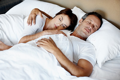 Buy stock photo Couple, sleeping and relax in bed with tired people in home, calm or serene with rest together. Man, woman and asleep with peace at house, break or dream with cuddling, comfort or cozy for nap