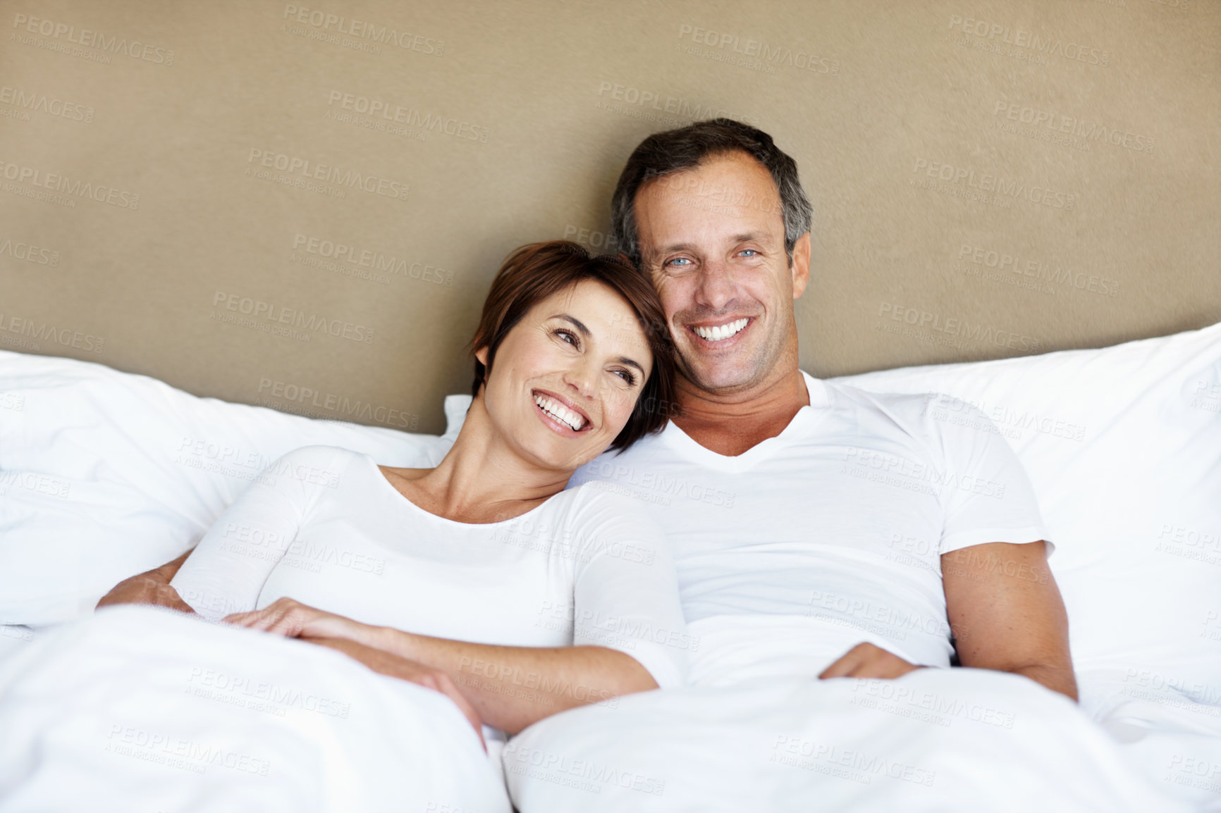 Buy stock photo Relax, morning and love with couple in bedroom for romance, valentines day and marriage. Portrait, getaway and care with man and woman in home or staycation for anniversary retreat and smile
