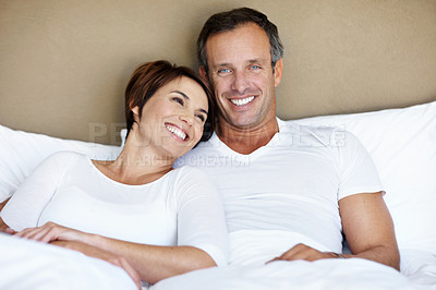 Buy stock photo Love, relax and happy with couple in bedroom in home for wake up, connection and romantic partner. Bonding, support and morning with portrait of man and woman in bed in apartment for trust and care