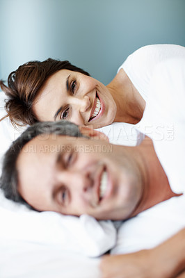 Buy stock photo Love, relax and wake up with couple in bedroom in home for smile, connection and romantic partner. Bonding, support and morning with man and woman in bed in apartment for portrait, happy and care