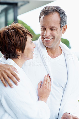 Buy stock photo Travel, smile and relax with couple at hotel for romantic getaway, bonding and connection. Happy, anniversary vacation and hospitality with mature man and woman in villa for marriage and committed