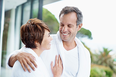 Buy stock photo Travel, smile and love with couple at hotel for romantic getaway, bonding and connection. Happy, anniversary vacation and hospitality with mature man and woman in villa for marriage and committed