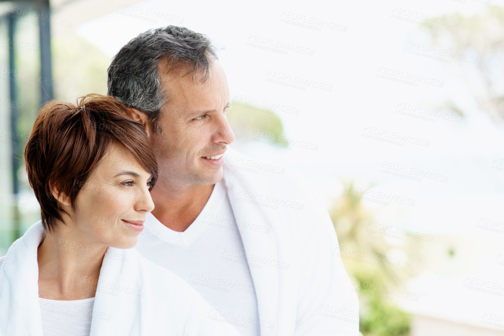 Buy stock photo Smile, thinking and balcony with couple at hotel for travel, anniversary getaway or love. Marriage, holiday villa and hospitality with man and woman relax at resort for view, vision or space