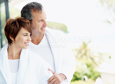 Buy stock photo Smile, view and balcony with couple at hotel for travel, anniversary getaway or love. Marriage, holiday villa and hospitality with man and woman relax at resort for thinking, vision or space