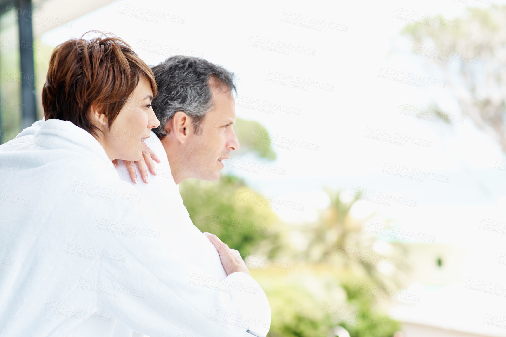 Buy stock photo View, thinking and balcony with couple at hotel for travel, anniversary getaway or love. Marriage, holiday villa and hospitality with man and woman for relax, vision or vacation space with break