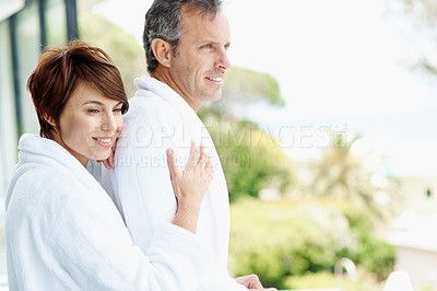 Buy stock photo Smile, hug and balcony with couple at hotel for travel, anniversary getaway or love. Marriage, holiday villa and hospitality with mature man and woman for relax, vision and vacation space