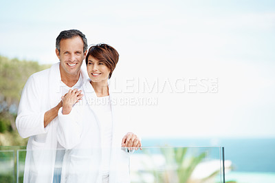 Buy stock photo Love, hug and balcony with couple at hotel for travel, anniversary getaway and bonding. Marriage, holiday villa and portrait with man and woman relax at resort for view, mockup space and support