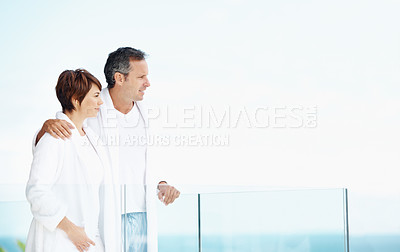 Buy stock photo Love, view and balcony with couple at hotel for travel, anniversary getaway and bonding. Marriage mockup, holiday villa and hospitality with mature man and woman for vision, space and support