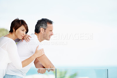 Buy stock photo Calm, thinking or couple on balcony with hug, trip memory or tender perspective on romantic vacation. Relax, space and people with embrace, peaceful reflection or marriage nostalgia on summer holiday