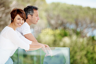 Buy stock photo Love, balcony and view with couple in home for morning, bonding and connection together. Support, wake up and commitment with man and portrait of woman in house for loyalty, care and marriage peace