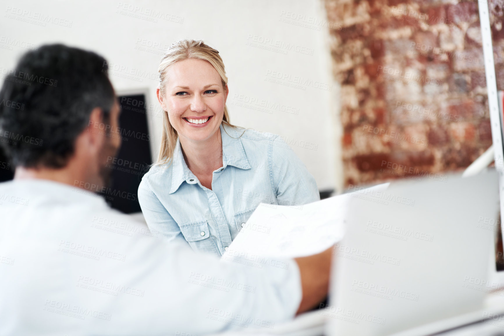 Buy stock photo Smile, feedback and documents with business woman in office for interior design, project and team. Blueprint review, architect brainstorming and employees in agency for proposal and research