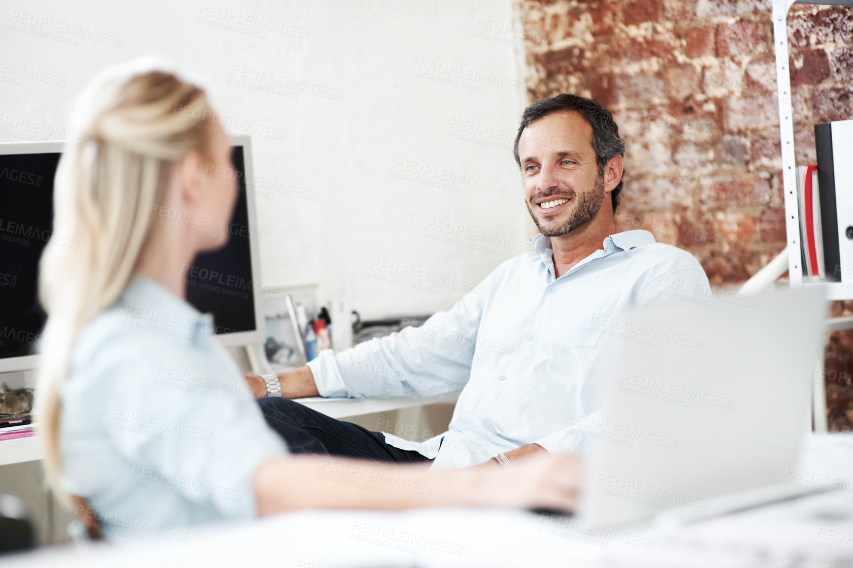 Buy stock photo Smile, team and planning with business man in office for branding review, mentor feedback and project. Campaign advisor, marketing manager and happy with employees in creative agency for media