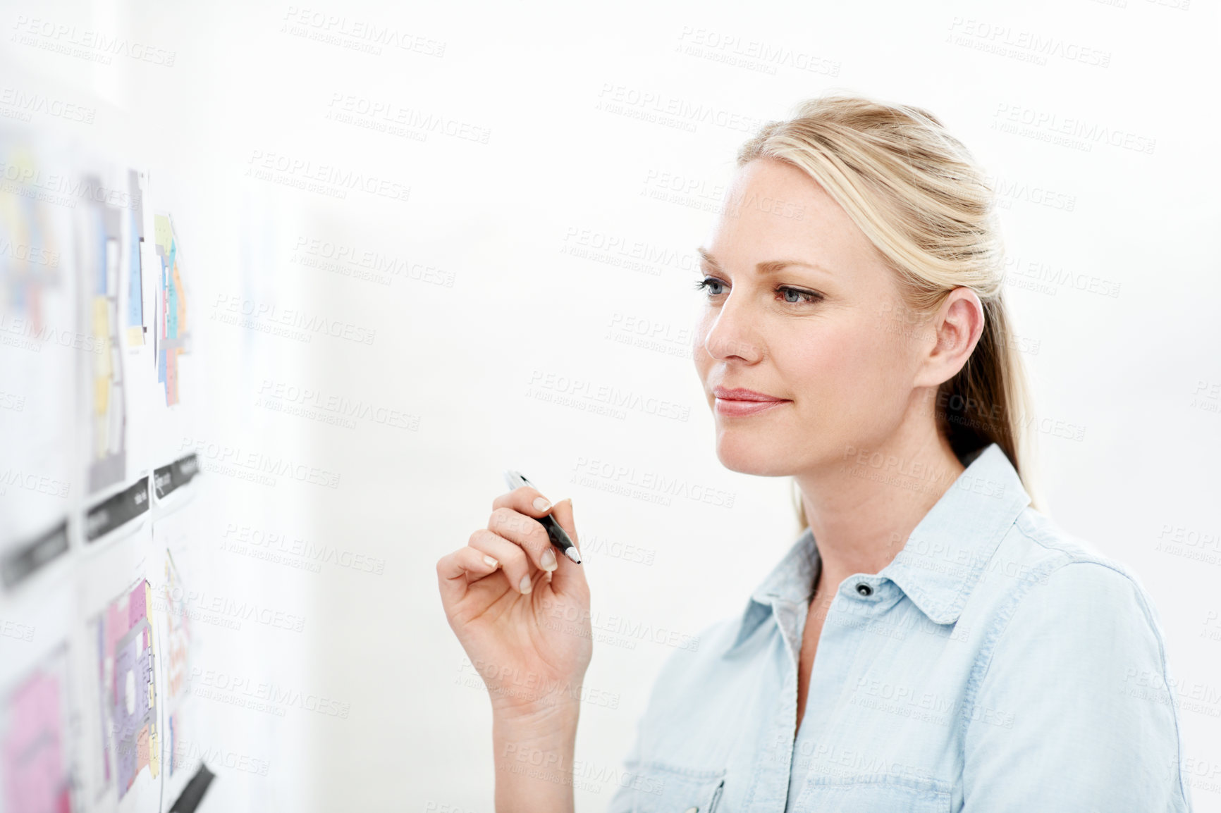 Buy stock photo Business woman, smile and blueprint on board with review of layout, architecture and strategy analysis. Office, ideas or architect with pen for floor plan, renovation overview or project management