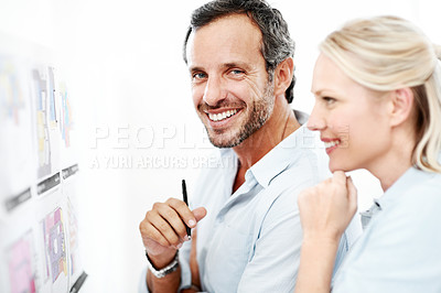 Buy stock photo Planning, board and documents with business people in office for design, project and team. Blueprint review, architect brainstorming and portrait of happy employee in agency for proposal and meeting