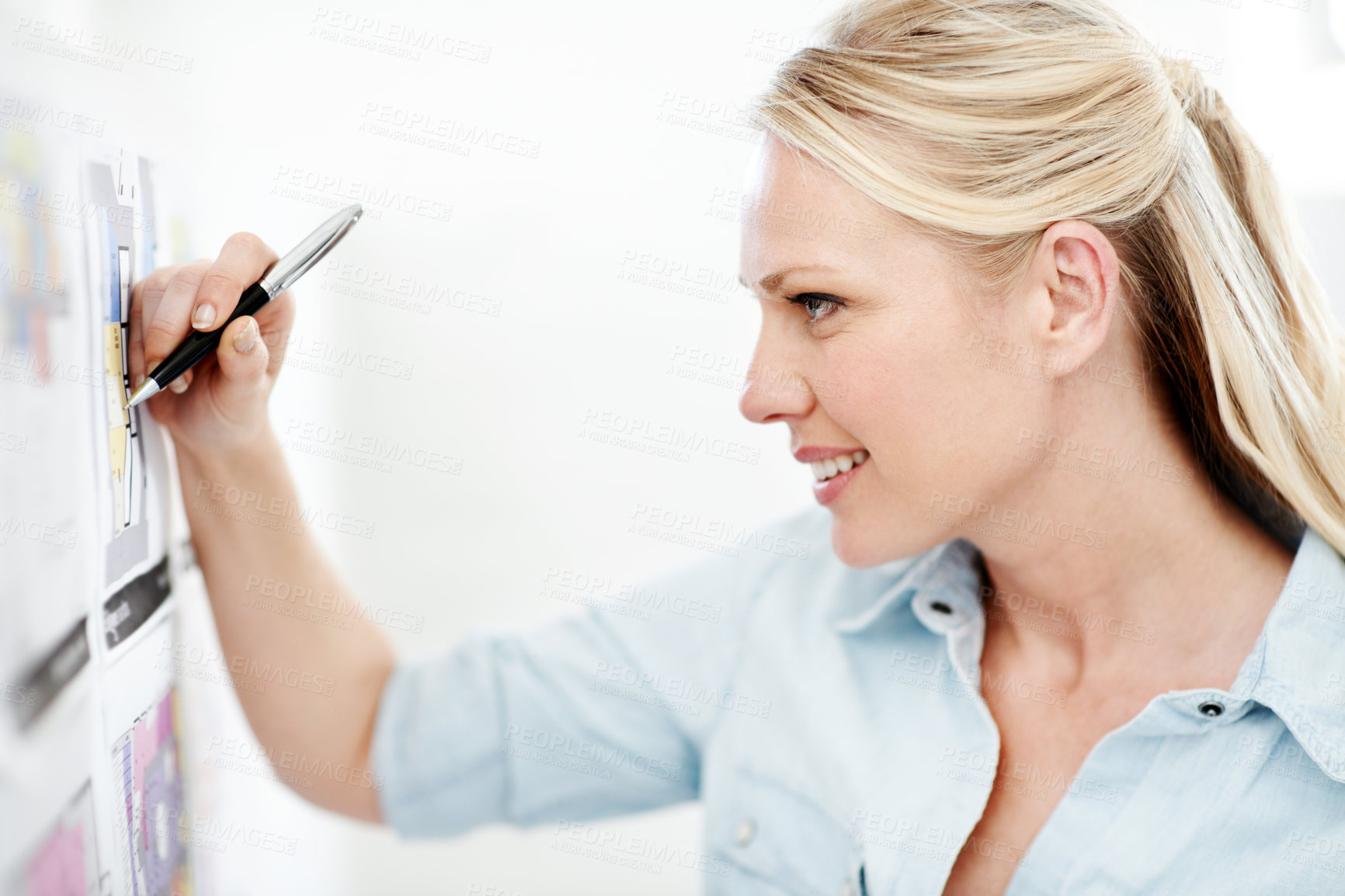Buy stock photo Business woman, writing and blueprint on board with review of layout, architecture and strategy analysis. Profile, smile or architect with pen for floor plan, renovation overview and white background