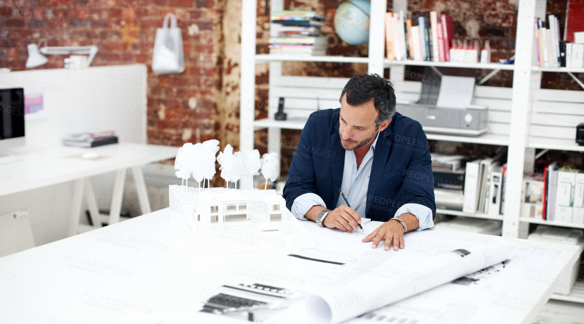 Buy stock photo Architecture, drawing and man in office with model for civil engineering, design or review. Architect, mature person and blueprint planning, contractor or employee with sketching paperwork at agency