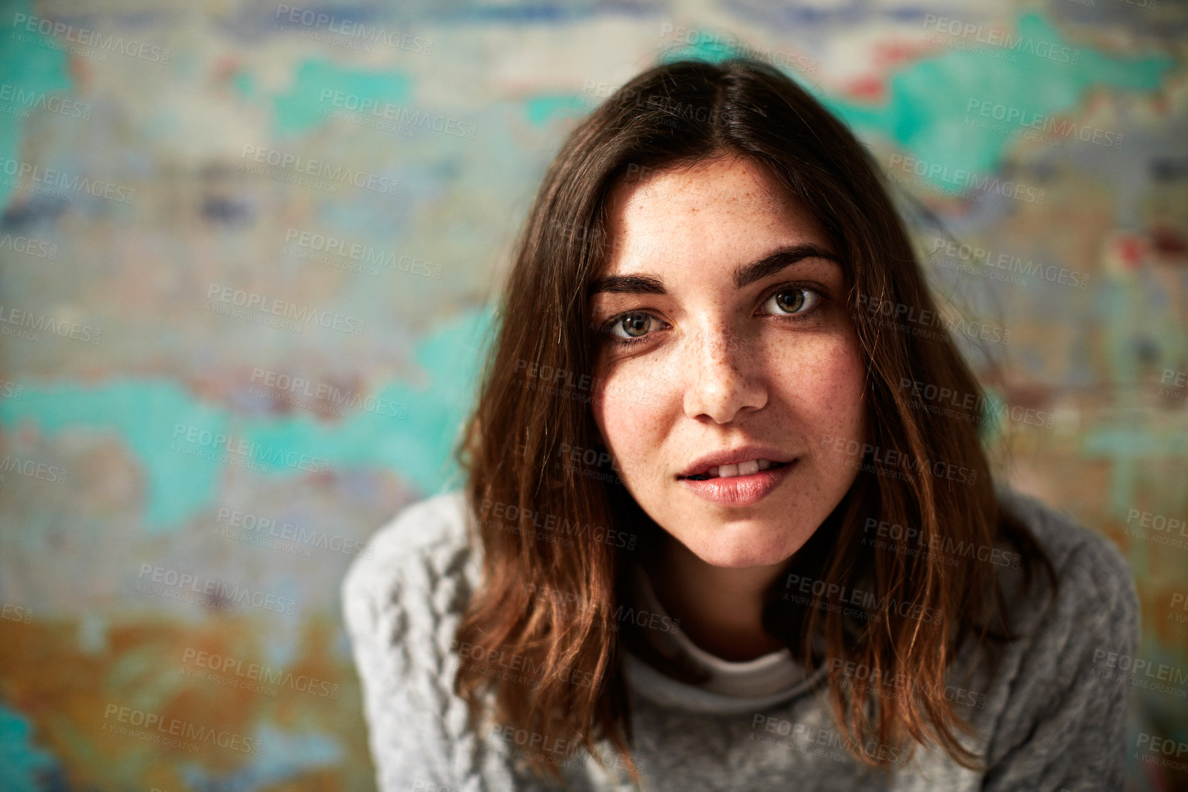 Buy stock photo Happy, woman and student at wall with portrait, ambition and exchange program for college education. Smile, person and pride at campus for knowledge, university scholarship and learning opportunity