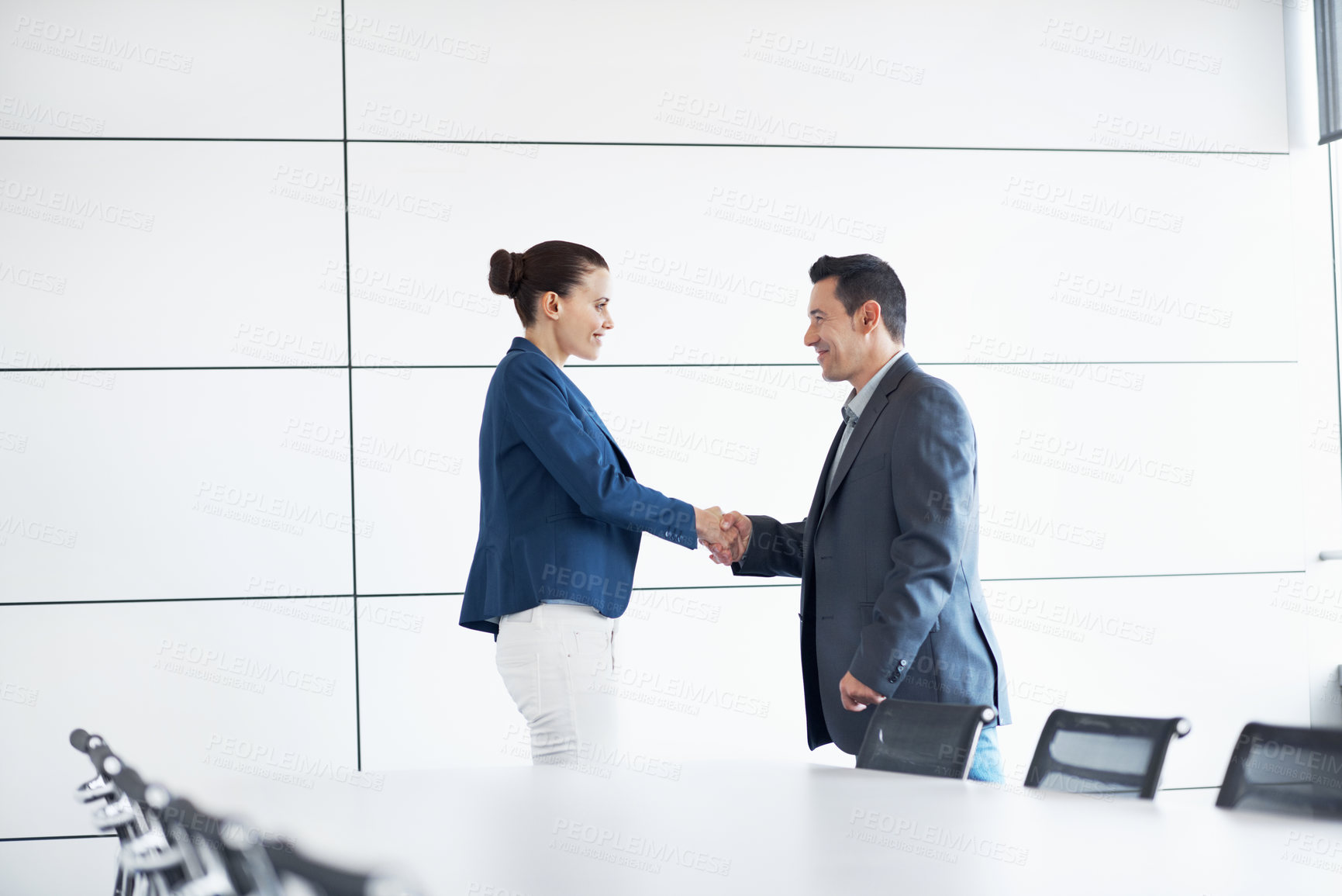 Buy stock photo Interview, people or happy with handshake in meeting for internal vacancy, new recruit and welcome. Boardroom, HR manager or candidate shaking hands for company promotion, contract renewal and hiring