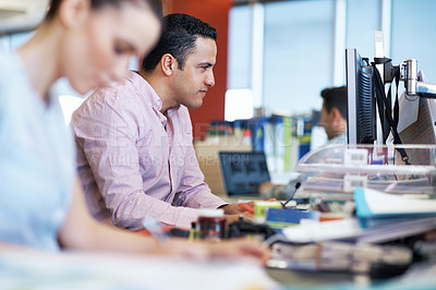 Buy stock photo Shot of a people working at their desks in an office