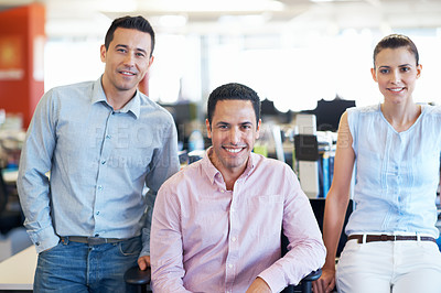 Buy stock photo Portrait of a three smiling coworkers in an office