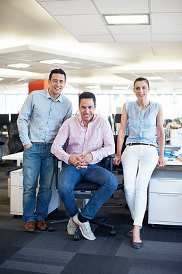 Buy stock photo Portrait of a three smiling coworkers in an office