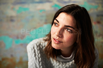 Buy stock photo Shot of a young woman posing in front of a map on a wall