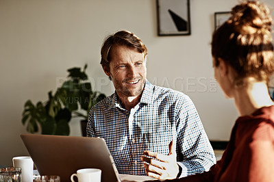 Buy stock photo Shot of a couple working together at home