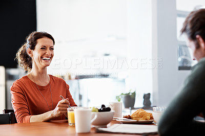 Buy stock photo Shot of a mature couple having breakfast together
